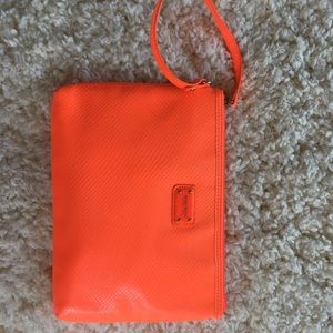 Nine West neon wristlet.